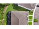 Aerial view of the community, featuring well-manicured lawns and a shared swimming pool at 17238 Blessing Dr, Clermont, FL 34714