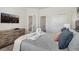 Nicely decorated bedroom with television and ensuite bathroom at 17238 Blessing Dr, Clermont, FL 34714