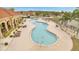 Aerial shot of a community pool with lounge chairs at 1783 Coriander Dr, Kissimmee, FL 34759