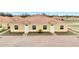 Newly built home with a red-tile roof, brick paver entrance and lush landscaping at 1783 Coriander Dr, Kissimmee, FL 34759