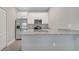 Well-equipped kitchen with stainless steel appliances and granite countertops at 1783 Coriander Dr, Kissimmee, FL 34759