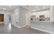 Open floorplan with a modern kitchen featuring stainless steel appliances and granite countertops at 1783 Coriander Dr, Kissimmee, FL 34759