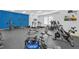 Bright and spacious gym with a variety of equipment and machines for a complete workout at 2039 Derwent Dr, Davenport, FL 33896