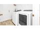 Convenient laundry room featuring a modern washer and dryer for easy laundry days at 2039 Derwent Dr, Davenport, FL 33896
