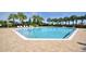 Relax in this community's sparkling pool, perfect for enjoying the sunny weather and cooling off on hot days at 2039 Derwent Dr, Davenport, FL 33896