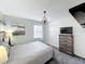 Bedroom with gray walls, carpeted floor, ceiling fan, and closet at 2105 Mallory Cir, Haines City, FL 33844