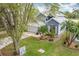 Charming two-story home features a two-car garage, mature landscaping and well-maintained lawn at 2105 Mallory Cir, Haines City, FL 33844