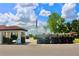 Golf carts lined up, ready for a day on the golf course under sunny skies at 2105 Mallory Cir, Haines City, FL 33844