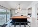 Kitchen with breakfast bar and view to backyard at 2105 Mallory Cir, Haines City, FL 33844