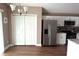 Spacious kitchen with stainless steel refrigerator and modern cabinetry at 214 Kay St, Auburndale, FL 33823