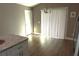 Kitchen with stainless appliances and large sliding glass door at 214 Kay St, Auburndale, FL 33823