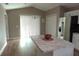 Kitchen with stainless appliances, an island, and plenty of natural light at 214 Kay St, Auburndale, FL 33823