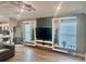 Bright open-concept living room with modern built-ins and ample natural light at 214 Kay St, Auburndale, FL 33823