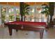Billiard table in a recreational room with great lighting and patio access at 215 Cordova Ave, Davenport, FL 33897