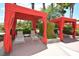 Poolside cabanas with lounge chairs for relaxation and shade near the pool at 215 Cordova Ave, Davenport, FL 33897
