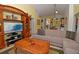 Comfortable living room featuring stylish furniture and an entertainment center at 215 Cordova Ave, Davenport, FL 33897