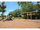 Community playground offers a fun, safe space for to play with swings and play equipment at 215 Cordova Ave, Davenport, FL 33897