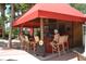 Outdoor bar area by the pool with seating and a fun, lively atmosphere at 215 Cordova Ave, Davenport, FL 33897