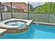 Close-up of the jacuzzi and pool area with 3 ft. depth markings at 215 Cordova Ave, Davenport, FL 33897