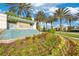 Welcoming community entrance with lush landscaping and a fountain, creating an inviting first impression at 2460 Promenade Dr, St Cloud, FL 34772