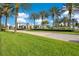 Scenic view of the Twin Lakes community entrance showcasing lush landscaping and well-maintained grounds at 2460 Promenade Dr, St Cloud, FL 34772