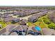 Sprawling community featuring beautiful homes, green spaces, and a serene pond, showcasing a vibrant neighborhood at 2468 Varenna Loop, Kissimmee, FL 34741