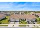 Aerial view showcasing the community's layout and lush landscaping in a neighborhood at 2814 Plymouth Pl, Kissimmee, FL 34741