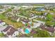 Aerial view showcasing the community pool, amenities, and neighborhood layout, offering a vibrant lifestyle at 3203 Rio Grande Trl, Kissimmee, FL 34741