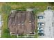 Overhead aerial view of the building's layout, roof design, and parking, highlighting its overall structure at 3203 Rio Grande Trl, Kissimmee, FL 34741