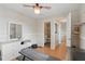 Bedroom with a bathroom and doors leading to other rooms, featuring ample space and natural light at 3203 Rio Grande Trl, Kissimmee, FL 34741