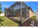 Enjoy outdoor living on this screened patio with ample space for dining or lounging at 3471 Julius Estates Blvd, Winter Haven, FL 33881