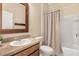 Cozy bathroom with shower-tub combo and decorative mirror at 3471 Julius Estates Blvd, Winter Haven, FL 33881