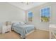 Comfortable bedroom with natural light and plush carpet at 3471 Julius Estates Blvd, Winter Haven, FL 33881