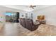 Bright living room with tile floors, sliding door to the patio, and lots of natural light at 3471 Julius Estates Blvd, Winter Haven, FL 33881