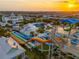Beautiful waterpark with colorful slides and pools offering fun for the whole Gathering, seen at sunset at 385 Southfield St, Kissimmee, FL 34747