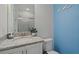 Clean bathroom with granite countertop, walk-in shower, and nice decorations at 385 Southfield St, Kissimmee, FL 34747
