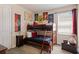 Charming bedroom with a cozy bunk bed and Harry Potter themed decor at 385 Southfield St, Kissimmee, FL 34747