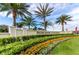 Entrance sign for the Encore Resort at Reunion with beautiful landscaping and palm trees at 385 Southfield St, Kissimmee, FL 34747