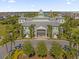 Exterior image of clubhouse with waterpark visible behind at 385 Southfield St, Kissimmee, FL 34747