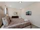 Comfortable main bedroom with bedside tables, dresser, and modern decor at 385 Southfield St, Kissimmee, FL 34747