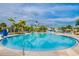 Large outdoor pool with a shallow end for children and plenty of lounge chairs for relaxing in the sun at 385 Southfield St, Kissimmee, FL 34747