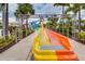Colorful water slides winding through lush landscaping, offering fun for the whole Gathering at 385 Southfield St, Kissimmee, FL 34747