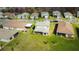 Expansive home boasts a large green backyard and covered patio perfect for entertaining at 3920 Reed Grass Pl, Kissimmee, FL 34746