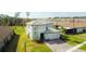 Lovely two-story home featuring a two car garage, well maintained lawn and tiled roof at 3920 Reed Grass Pl, Kissimmee, FL 34746