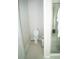 Bathroom featuring a toilet and a glass shower at 3920 Reed Grass Pl, Kissimmee, FL 34746