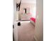 View into a light and bright bedroom with carpet flooring and modern dresser at 3920 Reed Grass Pl, Kissimmee, FL 34746