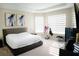 Spacious main bedroom with modern decor, comfortable furnishings, and natural light at 3920 Reed Grass Pl, Kissimmee, FL 34746
