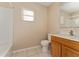 Functional bathroom features a tub/shower combination and vanity with sink at 502 Woodland Creek Blvd, Kissimmee, FL 34744