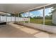 Screened patio overlooking a spacious backyard, perfect for outdoor enjoyment at 502 Woodland Creek Blvd, Kissimmee, FL 34744