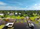 Scenic aerial view of waterfront property with two docks on the lake, perfect for boating at 6100 Alligator Lake W Shr, St Cloud, FL 34771